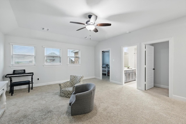 sitting room featuring visible vents, a ceiling fan, baseboards, and light carpet