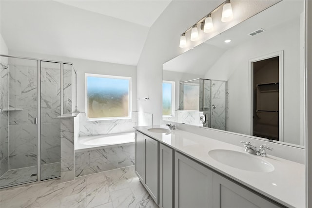 1436 Odette Dr, Arlington, TX 76013 - full bathroom featuring a marble finish shower, a garden tub, marble look tile flooring, double vanity, and lofted ceiling