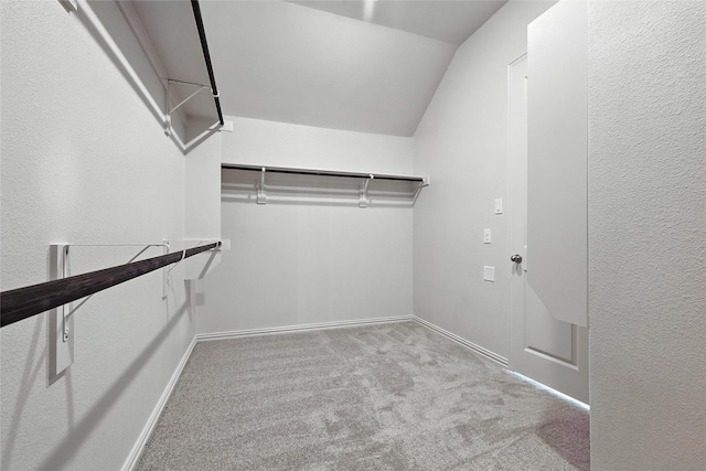 1436 Odette Dr, Arlington, TX 76013 - walk in closet featuring carpet and vaulted ceiling
