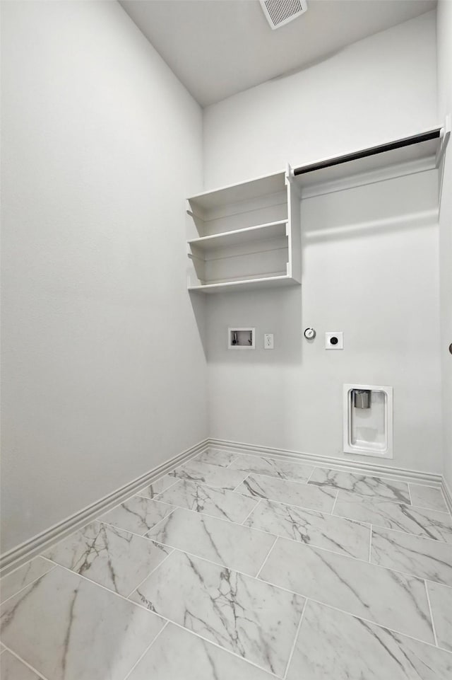1436 Odette Dr, Arlington, TX 76013 - laundry room with hookup for an electric dryer, gas dryer hookup, washer hookup, and marble look tiles