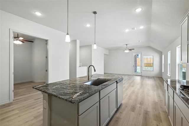 1436 Odette Dr, Arlington, TX 76013 - kitchen featuring ceiling fan, gray cabinets, light wood-type flooring, vaulted ceiling, and recessed lighting