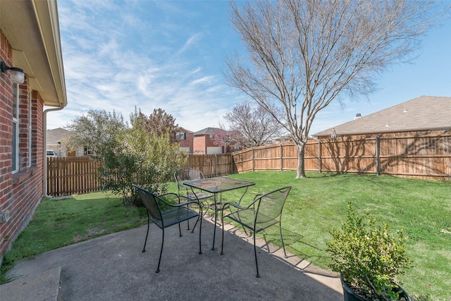 view of patio / terrace featuring outdoor dining space and a fenced backyard