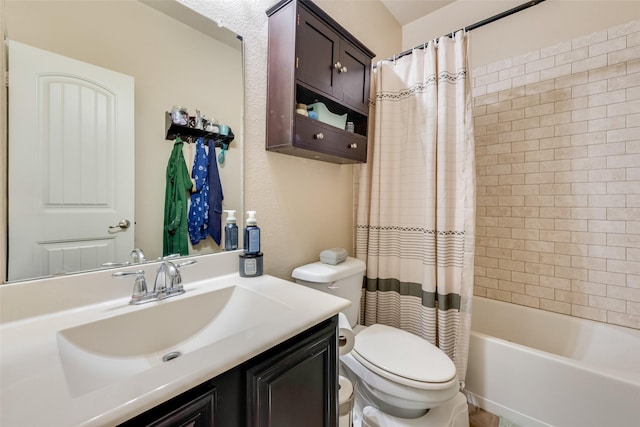 bathroom with shower / bathtub combination with curtain, toilet, and vanity