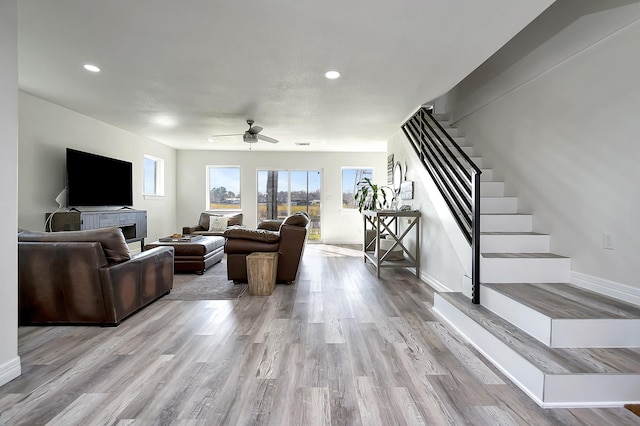6837 Briar Rd, Azle, TX 76020 - living room featuring stairway, ceiling fan, wood finished floors, recessed lighting, and baseboards