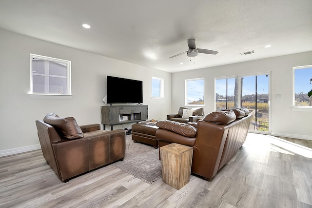 6837 Briar Rd, Azle, TX 76020 - living room with ceiling fan, light wood-type flooring, baseboards, and recessed lighting