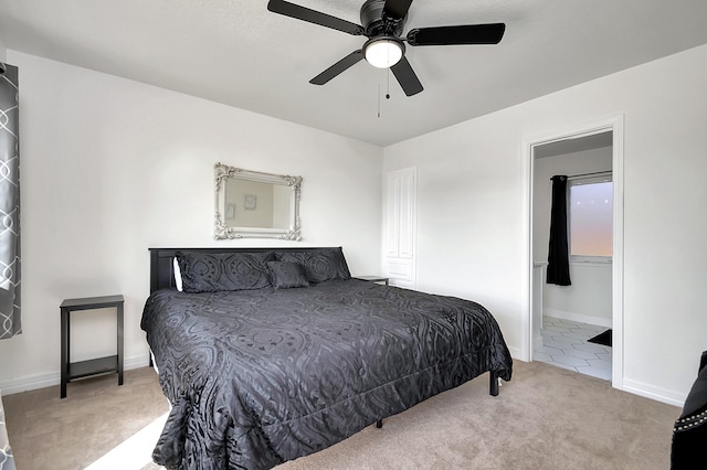 6837 Briar Rd, Azle, TX 76020 - carpeted bedroom with ensuite bath, ceiling fan, and baseboards
