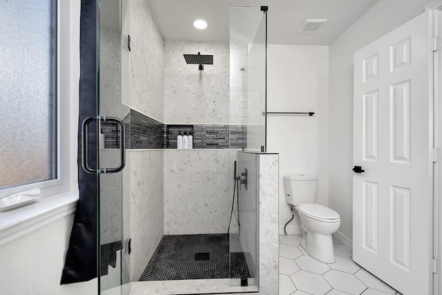 6837 Briar Rd, Azle, TX 76020 - bathroom featuring toilet, tile patterned floors, a shower stall, and recessed lighting