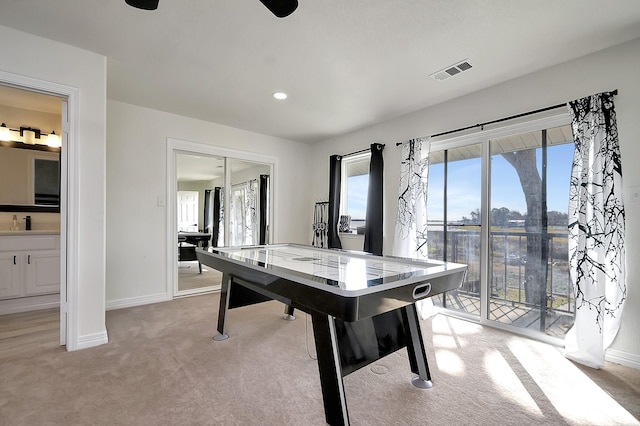 6837 Briar Rd, Azle, TX 76020 - playroom featuring light carpet, baseboards, recessed lighting, and a sink