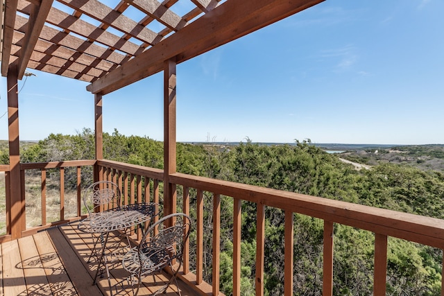 wooden deck featuring a pergola