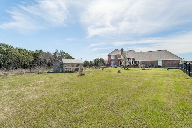 view of yard with fence