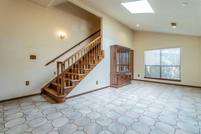 2881 Selma Ln, Farmers Branch, TX 75234 - spare room featuring a textured ceiling, wood finished floors, and crown molding