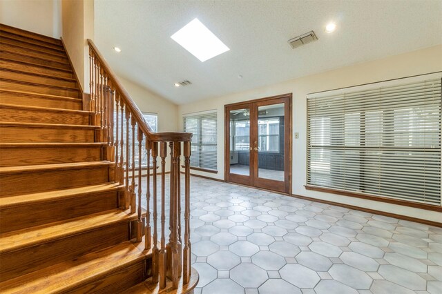 2881 Selma Ln, Farmers Branch, TX 75234 - spare room featuring a textured ceiling, wood finished floors, and ornamental molding