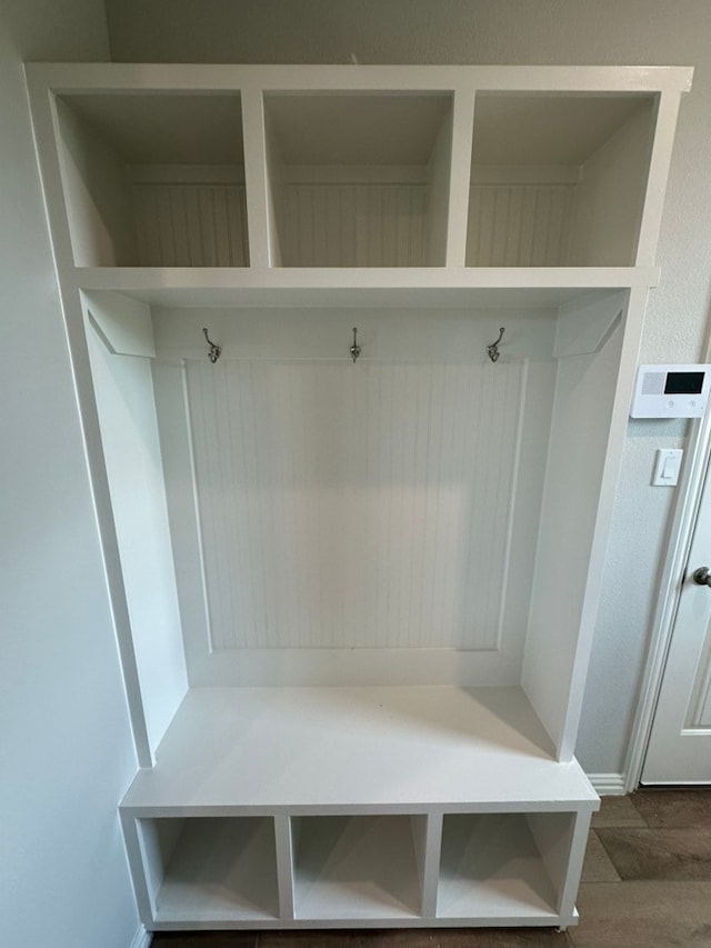 2465 Blackjack Oak Rd, Oak Ridge, TX 75161 - mudroom featuring dark wood finished floors and baseboards
