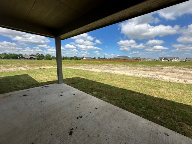 2465 Blackjack Oak Rd, Oak Ridge, TX 75161 - view of grassy yard featuring a patio