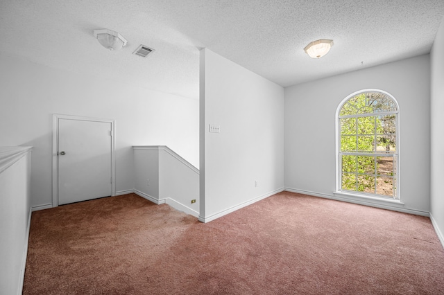 5327 Dusty Rd, Athens, TX 75752 - carpeted empty room with a textured ceiling and baseboards