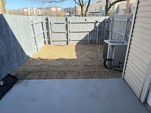 2240 Aspen Dr, Dallas, TX 75227 - view of patio / terrace with central air condition unit, fence, and a gate