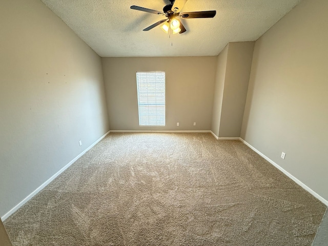 2240 Aspen Dr, Dallas, TX 75227 - carpeted empty room with baseboards, a textured ceiling, and a ceiling fan
