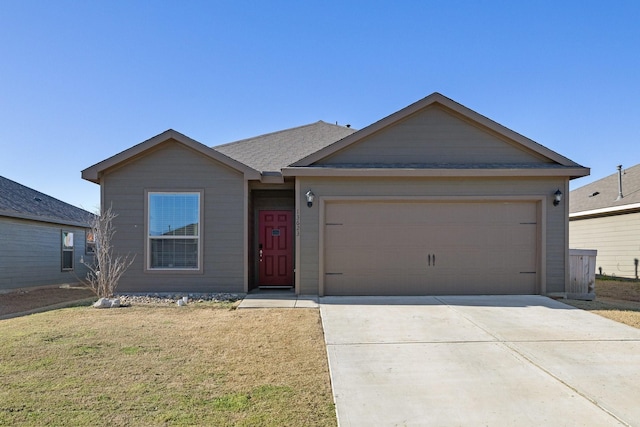 13623 Logan Pass Dr, Ponder, TX 76259 - single story home featuring a garage, concrete driveway, and a front yard