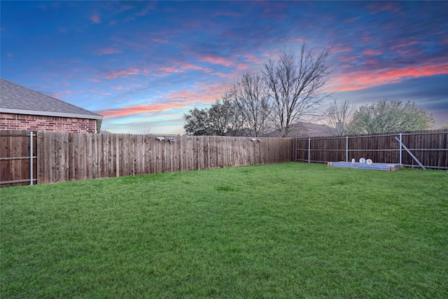 view of yard featuring a fenced backyard