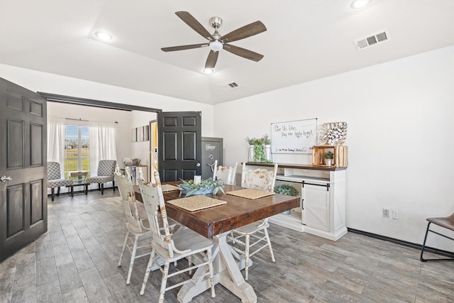 dining space with light wood-style flooring, visible vents, recessed lighting, and a ceiling fan