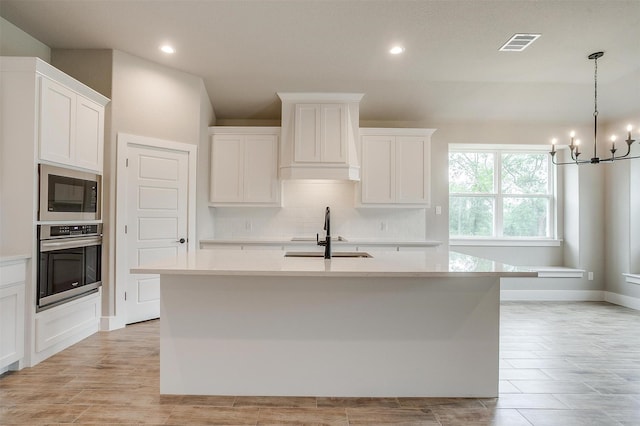 312 Falcon Ct, Springtown, TX 76082 - kitchen featuring oven, a sink, built in microwave, light countertops, and recessed lighting