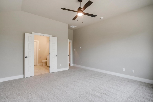 312 Falcon Ct, Springtown, TX 76082 - unfurnished bedroom featuring light carpet, connected bathroom, baseboards, and a ceiling fan