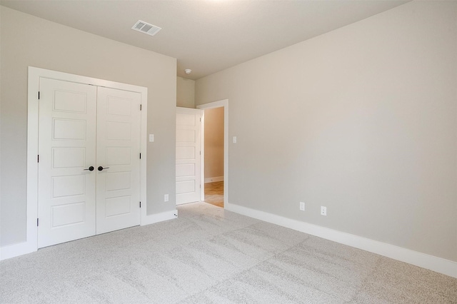 312 Falcon Ct, Springtown, TX 76082 - unfurnished bedroom with carpet, a closet, and baseboards