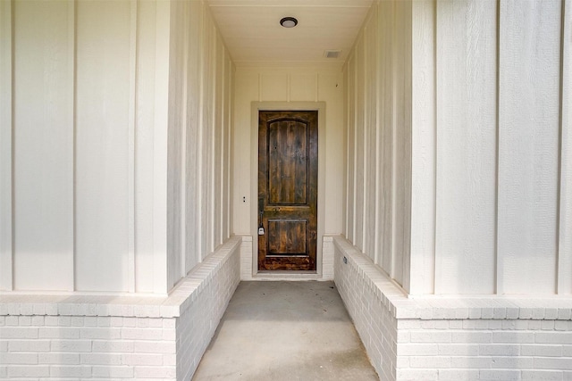 312 Falcon Ct, Springtown, TX 76082 - view of exterior entry featuring board and batten siding