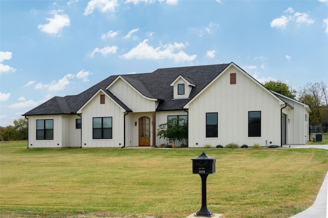 3020 Addison Rowen Ct, Sherman, TX 75090 - modern farmhouse featuring board and batten siding, a front lawn, and roof with shingles
