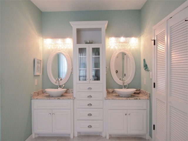 1430 State Highway 87 S, Hemphill, TX 75948 - bathroom featuring a closet and vanity