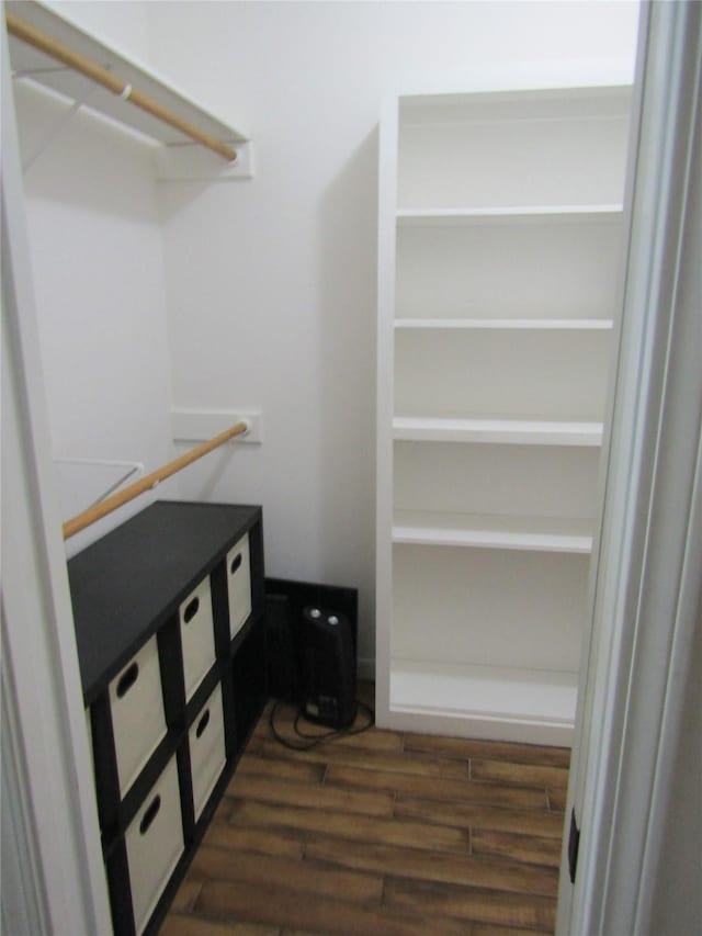 1430 State Highway 87 S, Hemphill, TX 75948 - spacious closet with dark wood-type flooring