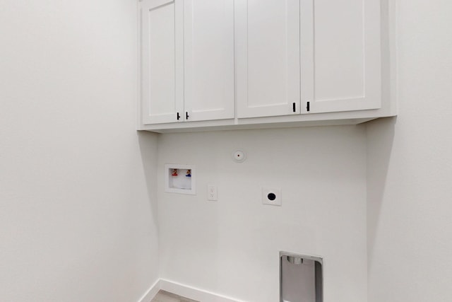 laundry room with hookup for an electric dryer, cabinet space, baseboards, hookup for a gas dryer, and washer hookup