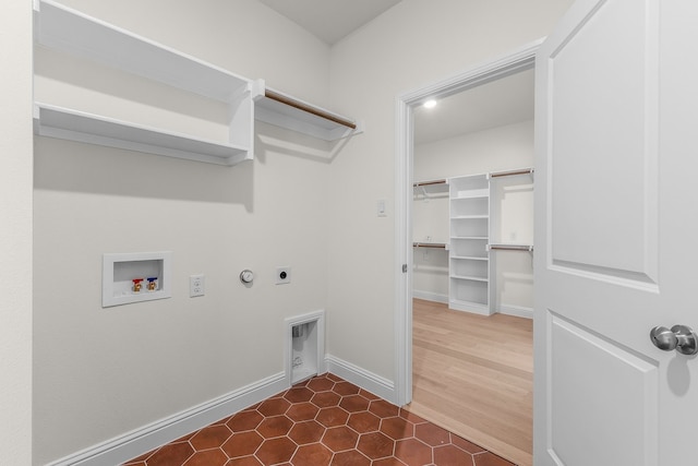 405 Red Roan Rdg, Brock, TX 76087 - laundry room featuring baseboards, gas dryer hookup, washer hookup, laundry area, and hookup for an electric dryer