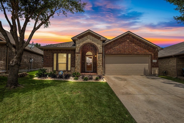 2725 Albatross Ln, Fort Worth, TX 76177 - view of front of property with an attached garage, concrete driveway, brick siding, a yard, and stone siding