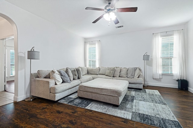 2725 Albatross Ln, Fort Worth, TX 76177 - living area with arched walkways, ceiling fan, and wood finished floors