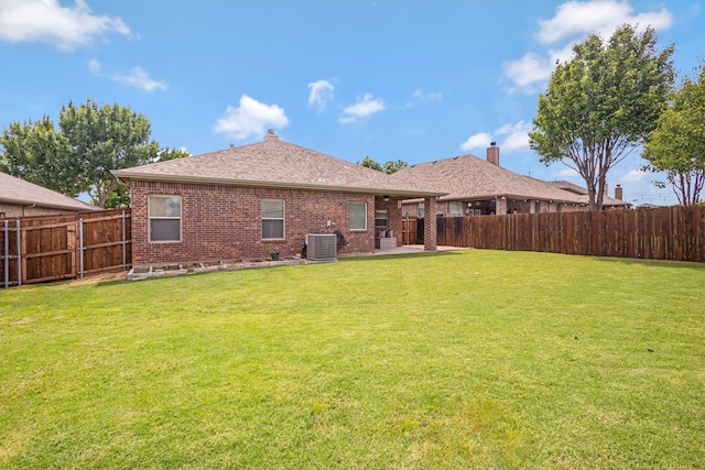2725 Albatross Ln, Fort Worth, TX 76177 - rear view of house featuring brick siding, a fenced backyard, a patio, and roof with shingles