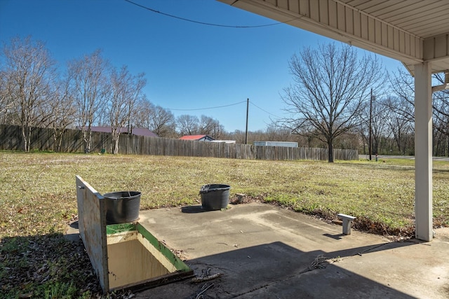 view of patio featuring fence