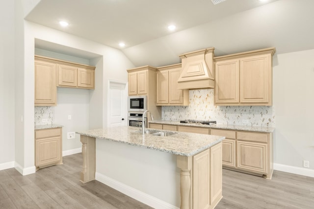 4400 Copper Point Dr, Fort Worth, TX 76036 - kitchen featuring black microwave, light brown cabinets, oven, premium range hood, and decorative backsplash