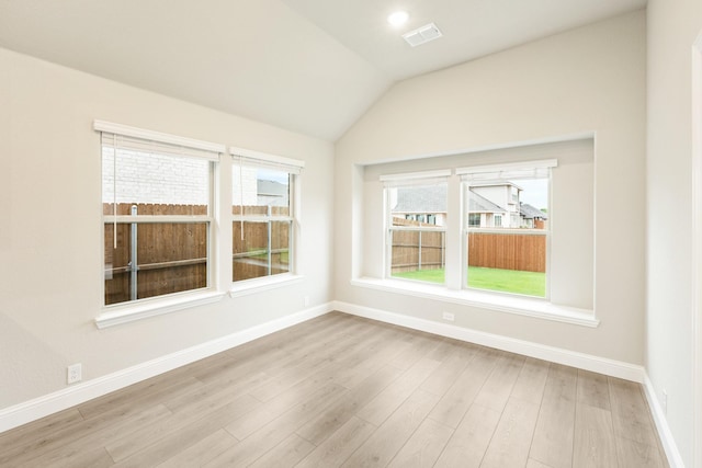 4400 Copper Point Dr, Fort Worth, TX 76036 - spare room with wood finished floors, vaulted ceiling, and recessed lighting