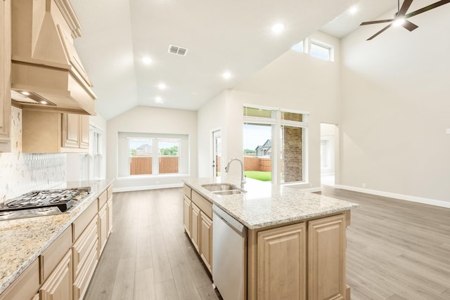 4400 Copper Point Dr, Fort Worth, TX 76036 - kitchen with dishwasher, premium range hood, stainless steel gas cooktop, light wood-style floors, and lofted ceiling