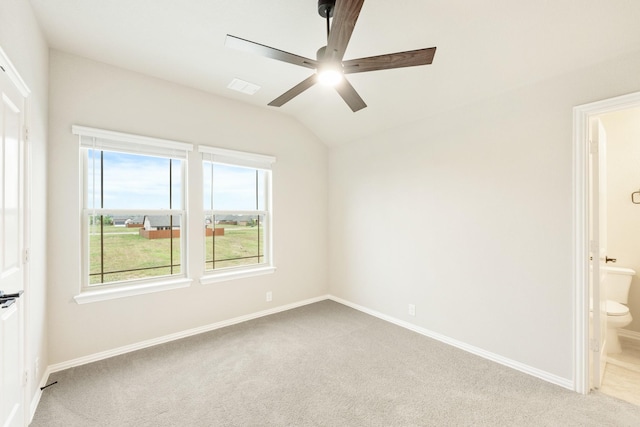 4400 Copper Point Dr, Fort Worth, TX 76036 - unfurnished bedroom featuring light colored carpet, lofted ceiling, ensuite bath, and a ceiling fan
