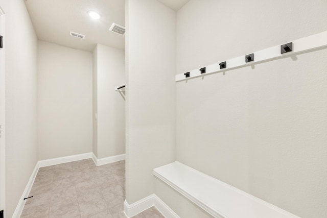4400 Copper Point Dr, Fort Worth, TX 76036 - mudroom featuring baseboards and light tile patterned flooring