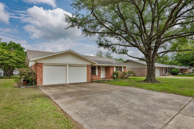 ranch-style house featuring a front yard, roof with shingles, brick siding, concrete driveway, and an attached garage