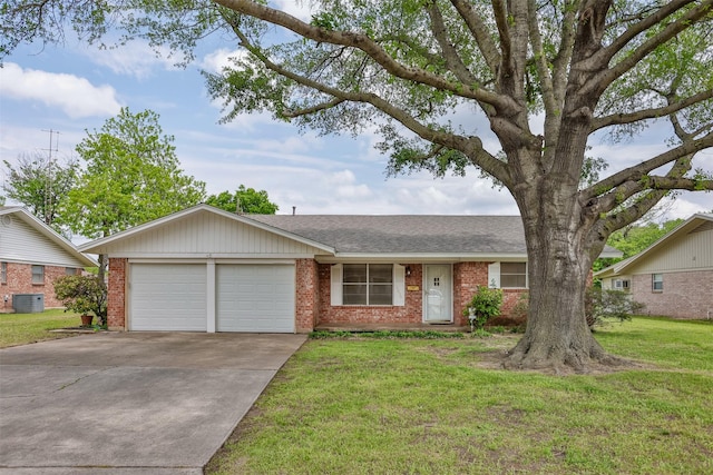 ranch-style home featuring brick siding, a garage, a front yard, and concrete driveway