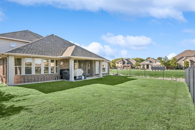 9413 Lakeway Dr, Denton, TX 76226 - rear view of house featuring brick siding, roof with shingles, and a patio