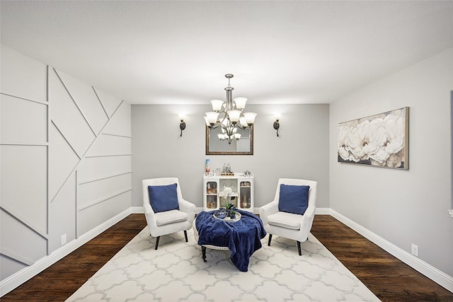 9413 Lakeway Dr, Denton, TX 76226 - living area featuring a chandelier, dark wood-style flooring, and baseboards