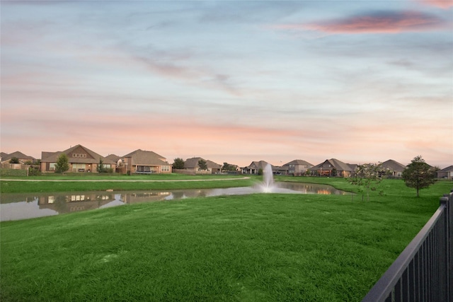 9413 Lakeway Dr, Denton, TX 76226 - yard at dusk featuring a water view, a residential view, and a lawn
