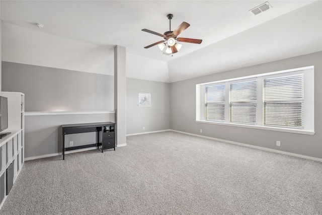 9413 Lakeway Dr, Denton, TX 76226 - unfurnished living room featuring a ceiling fan, carpet, baseboards, and vaulted ceiling