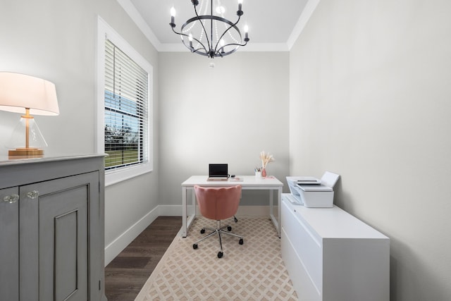 office area with baseboards, dark wood-type flooring, an inviting chandelier, and ornamental molding