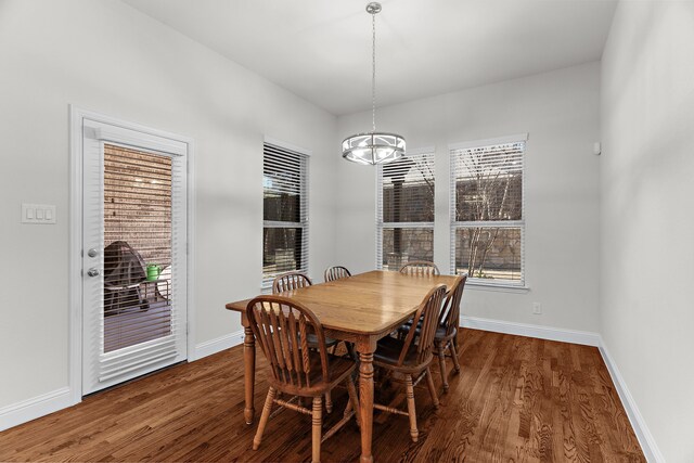 3509 Concord Dr, Melissa, TX 75454 - dining space with a chandelier, wood finished floors, and baseboards